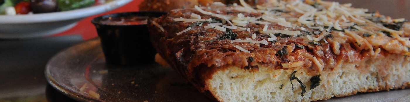 Slice of Sicilian pizza